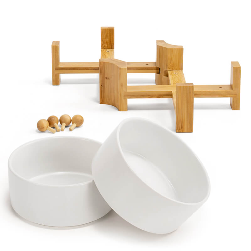 2 white dog bowls with the stand, plus 4 bamboo balls that can hold up the bowl