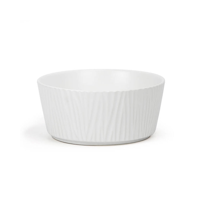 the front view of the large white ceramic dog bowl with bark pattern