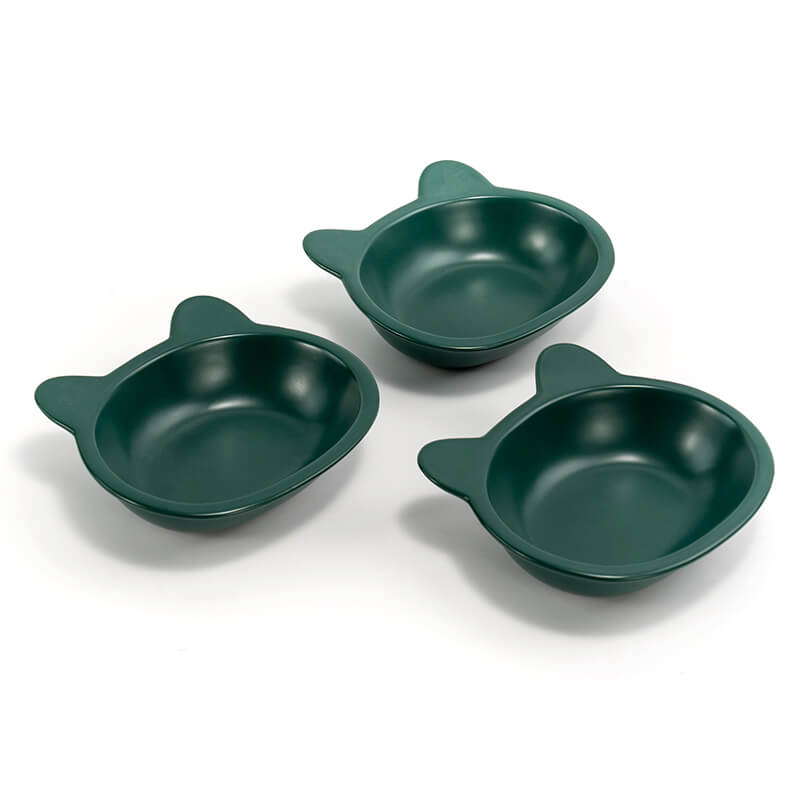 three neatly placed lovely green cat-shaped cat dishes