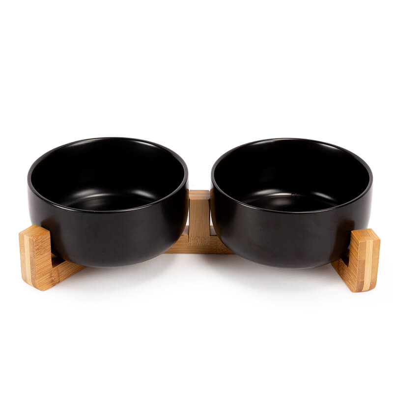 the front view of the black round ceramic dog bowl set
