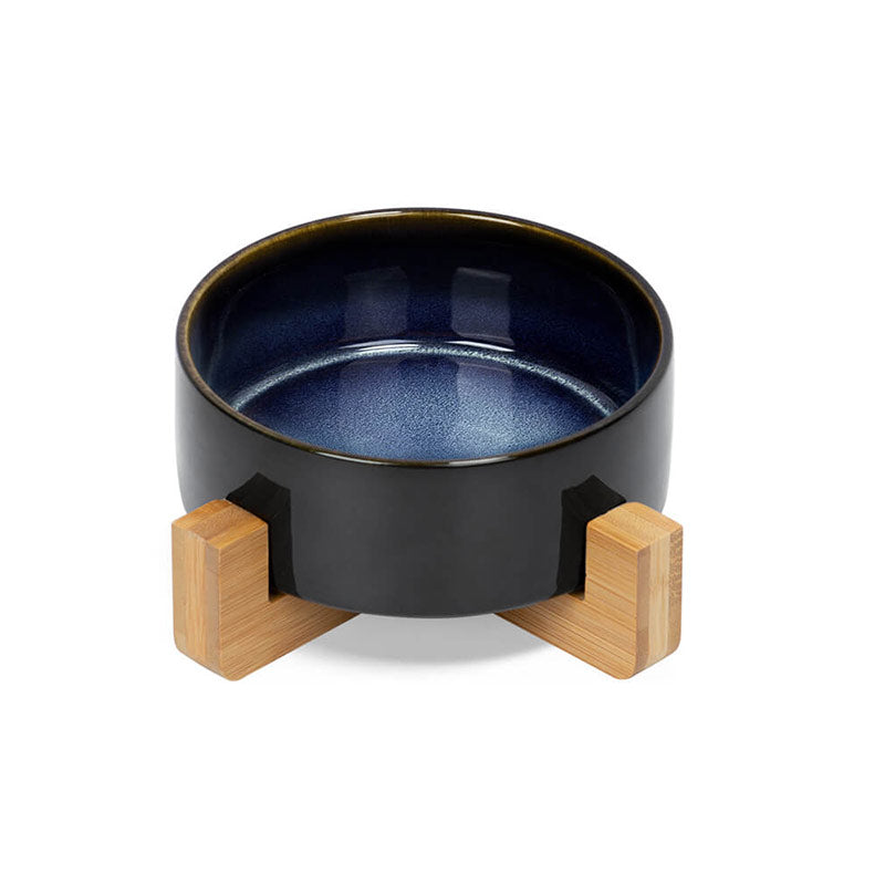 the front view of a ceramic dog bowl with starry sky pattern