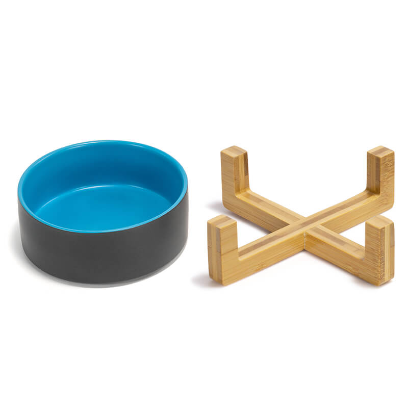 the grey-blue clashing ceramic dog bowl and its bamboo stand