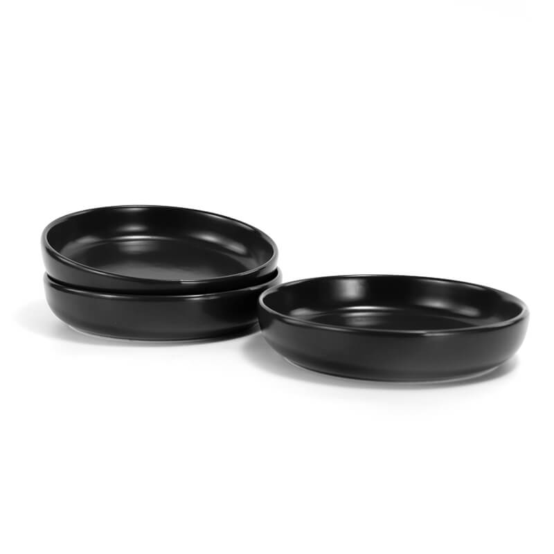 three black round cat dishes