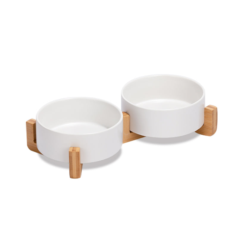 a cute white ceramic pet bowl set