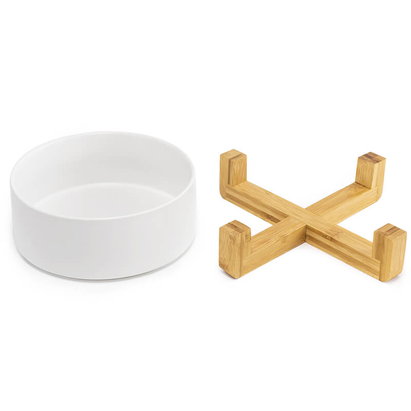 separate placement of the white cute dog bowl and its bamboo stand