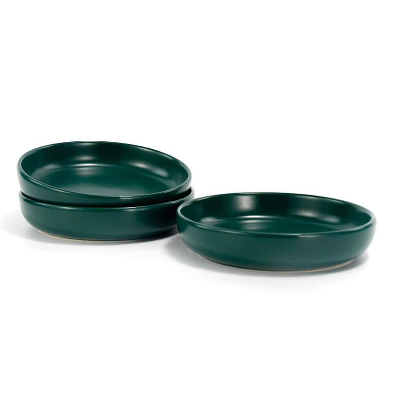 three green round cat dishes