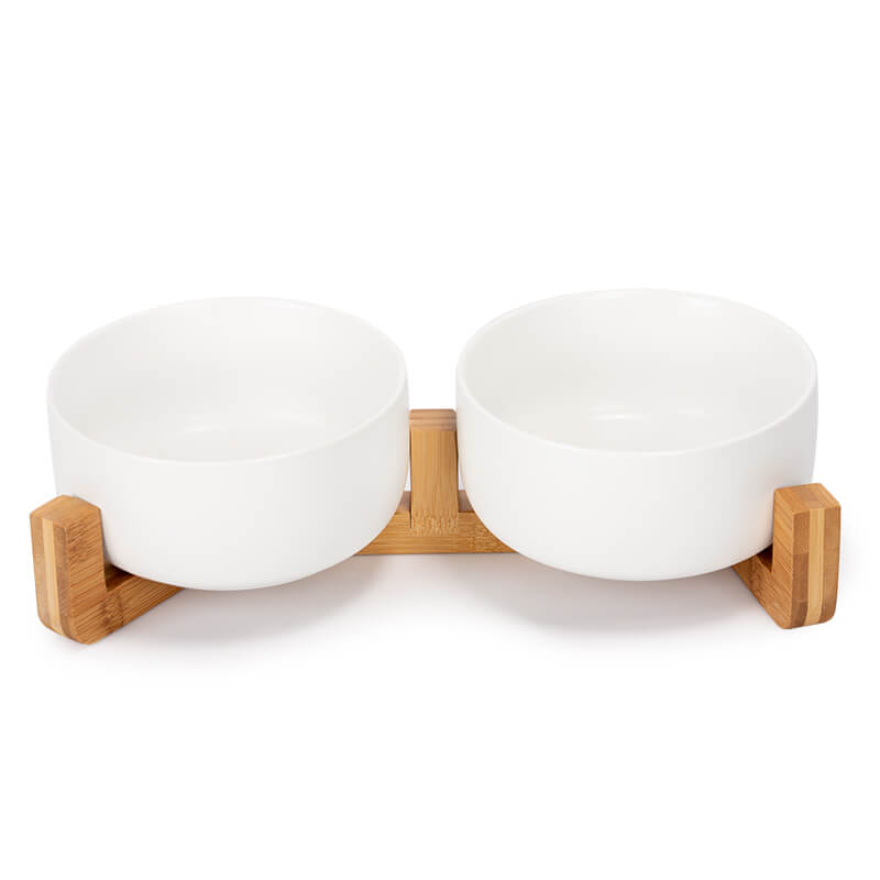 the front view of the white round ceramic dog bowl set